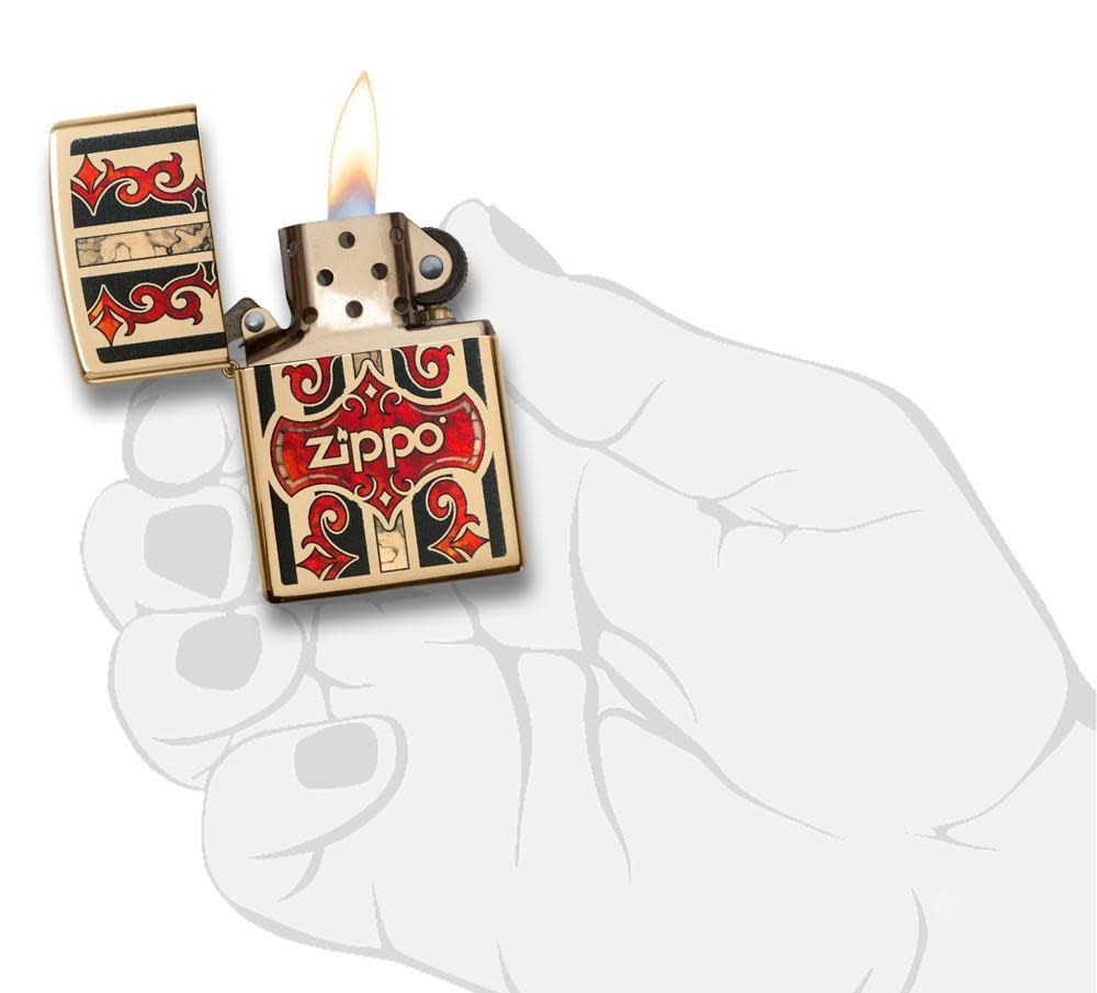 Front view of the Jazzy Zippo Logo with Red Vintage Embellishments, Fusion Process, in hand, open and lit